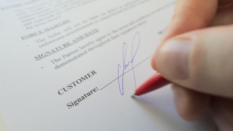 hand signing loan agreement